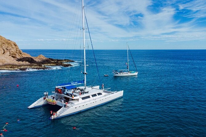 Cabo San Lucas Catamaran Cruise: Snorkel or Sunset Adventure - El Arco, Lover’s Beach, and the best photo moments