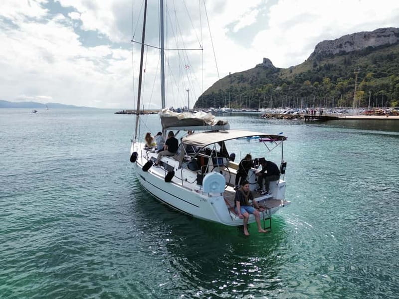 Cagliari: Catamaran Tour, Swimming, Snorkeling, & Prosecco - Cala Mosca: your first swim and snorkeling stop