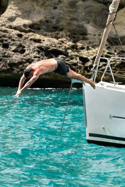 Cagliari: Catamaran Tour, Swimming, Snorkeling, & Prosecco - Cala Fighera gives you another chance to get in the water
