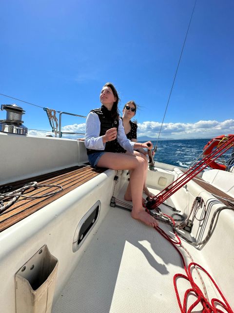 Cagliari: Sailing tour to Devil's Saddle aboard Merak - Swimming below the white cliff