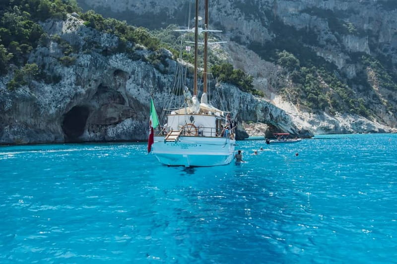 Cala Gonone: Gulf of Orosei Tour with a Vintage Sailing boat - Caves, tender rides, and the extras that matter