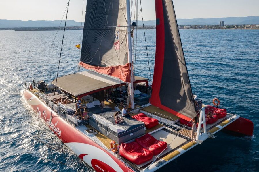 Cambrils: Catamaran Day Cruise with BBQ and Drinks - The atmosphere: relaxed first, livelier later