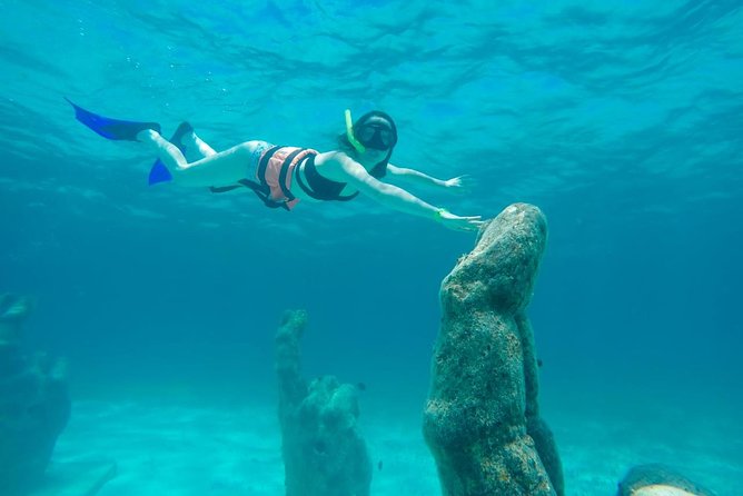 Cancun Half-Day Sailing Catamaran Cruise to Isla Mujeres - A quick afternoon at sea from Playa Langosta