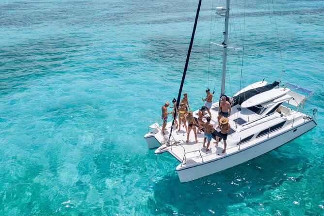 Cancun to Isla Mujeres Private Catamaran Cruising Snorkeling Fun! - Sailing toward the reef near El Meco