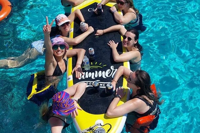 Cancun to Isla Mujeres Private Catamaran Cruising Snorkeling Fun! - Swimming and the return along the coast