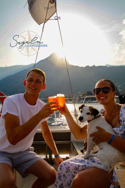 Cannero Riviera: Sunset Sailing Lago Maggiore - The Cannero promenade at golden hour