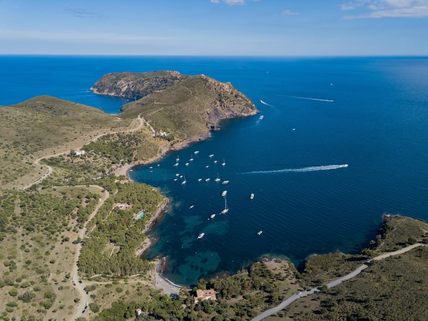 Cap Norfeu: Costa Brava Catamaran Trip with Underwater Views - Cap Norfeu, the natural centerpiece of the route