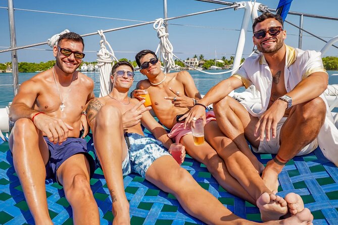Catamaran Booze Party With Open Bar in Cancun - Open bar, sparkling wine, and lunch on board