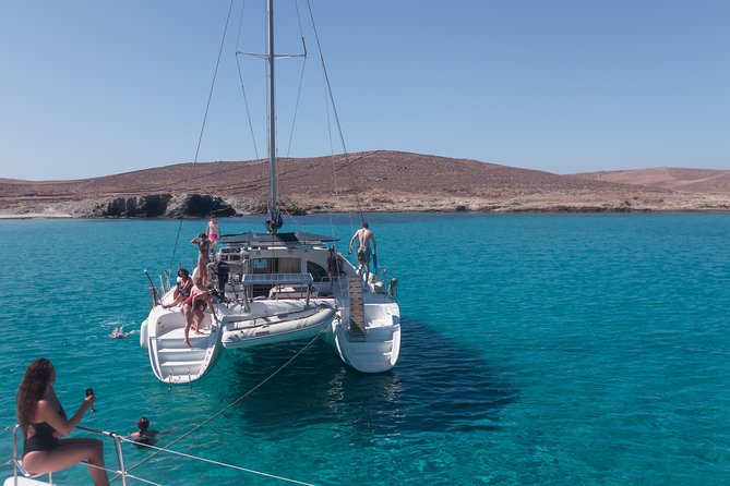 Catamaran Day & Sunset Cruises with meals Drinks and transportation - Delos from the water, with clear expectations