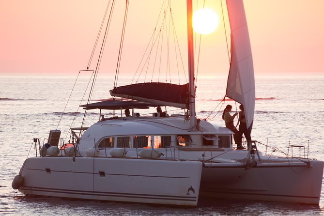Catamaran Day & Sunset Cruises with meals Drinks and transportation - Rhenia Island is the heart of the trip