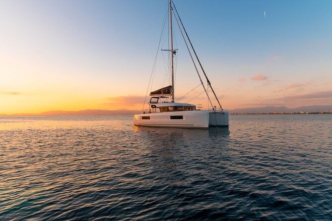 Catamaran Day & Sunset Cruises with meals Drinks and transportation - The return past Little Venice and the Mykonos windmills