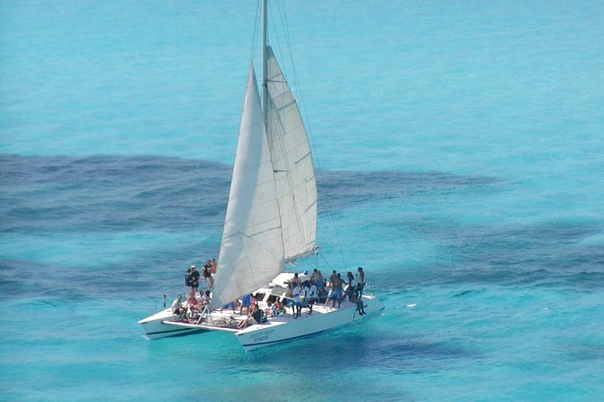 Catamaran Isla Mujeres Tour with Hotel Pick Up included - How the $89 price compares with what you receive