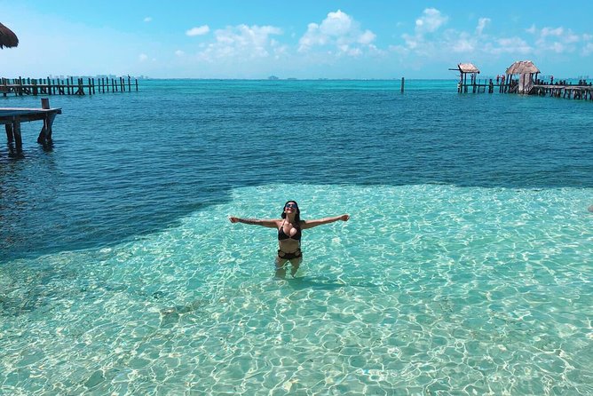 Catamaran Sailing to Isla Mujeres with Snorkeling, Lunch & Open Bar included - Isla Mujeres, buffet lunch, and beach-club time