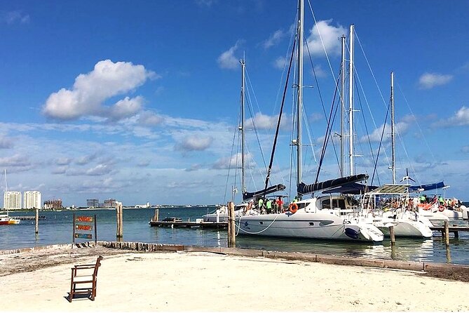 Catamaran to Isla Mujeres, Open bar, buffet, Beach Club Included - Two hours around Isla Mujeres