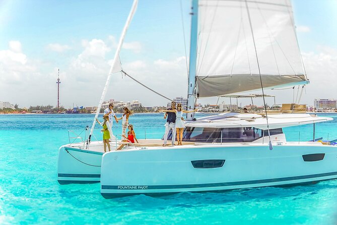 Catamaran to Isla Mujeres Snorkeling Tour with Open Bar and Lunch - The beach club stop near Isla Mujeres