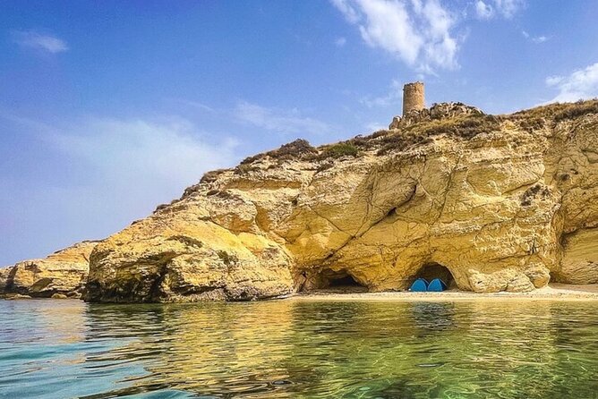 Catamaran tour stops bathing and snorkeling toast with prosecco - A relaxed way to see Cagliari from the water