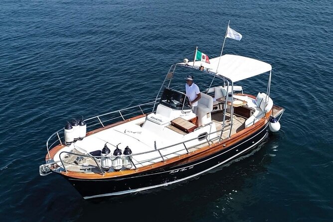 Catamaran tour stops bathing and snorkeling toast with prosecco - Leaving the port and watching for dolphins