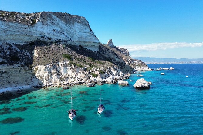 Catamaran tour stops bathing and snorkeling toast with prosecco - Cala Bernat and the first swim