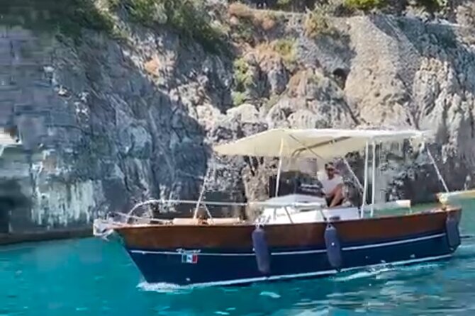Catamaran tour stops bathing and snorkeling toast with prosecco - Cala Fighera, the nudist beach