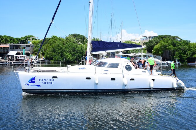 Catamaran Tour to Isla Mujeres, Open bar, Lunch, Snorkeling, Beach Club Included - Lunch and beach club time