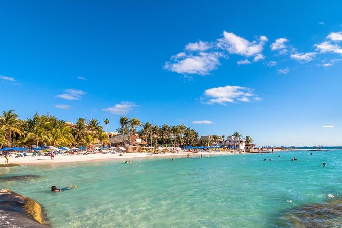 Catamaran Tour to Isla Mujeres, Open bar, Lunch, Snorkeling, Beach Club Included - What the $77 price really covers