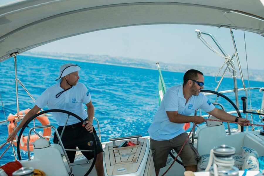 Catania: Coastline Sailing Trip 6hr with Aperitif and Lunch - Swimming near Acicastello and the Faraglioni
