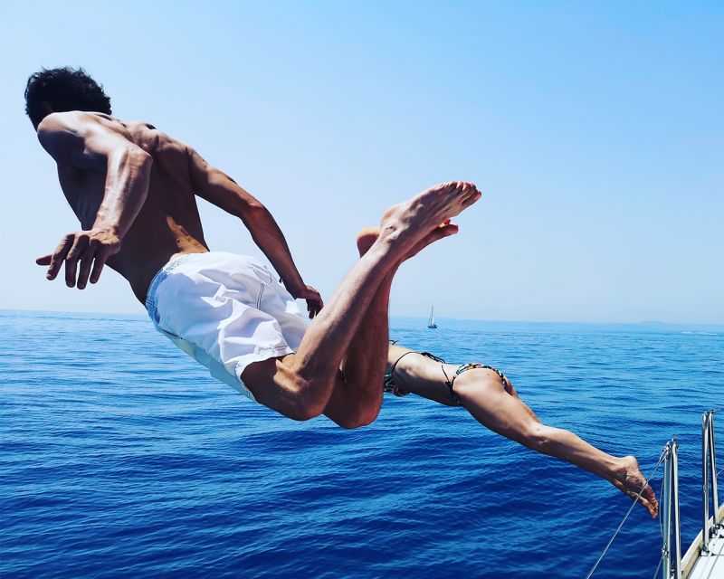 Catania: Coastline Sailing Trip with Aperitif and Prosecco - The swim stop in the Ionian Sea
