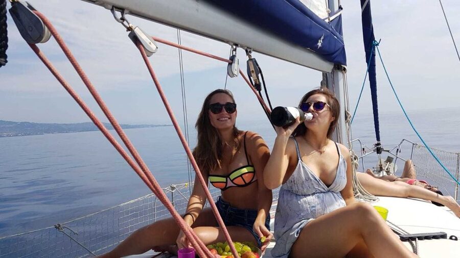 Catania: Spritz and Sunset Sailing Tour - The first hour: sailing toward the Ulysses caves