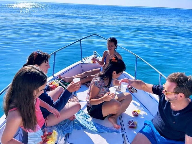 Cefalù: Mini Yacht Tour with Caves, Snorkeling, and Open Bar Aperitif - Kalura Beach and the first taste of the water
