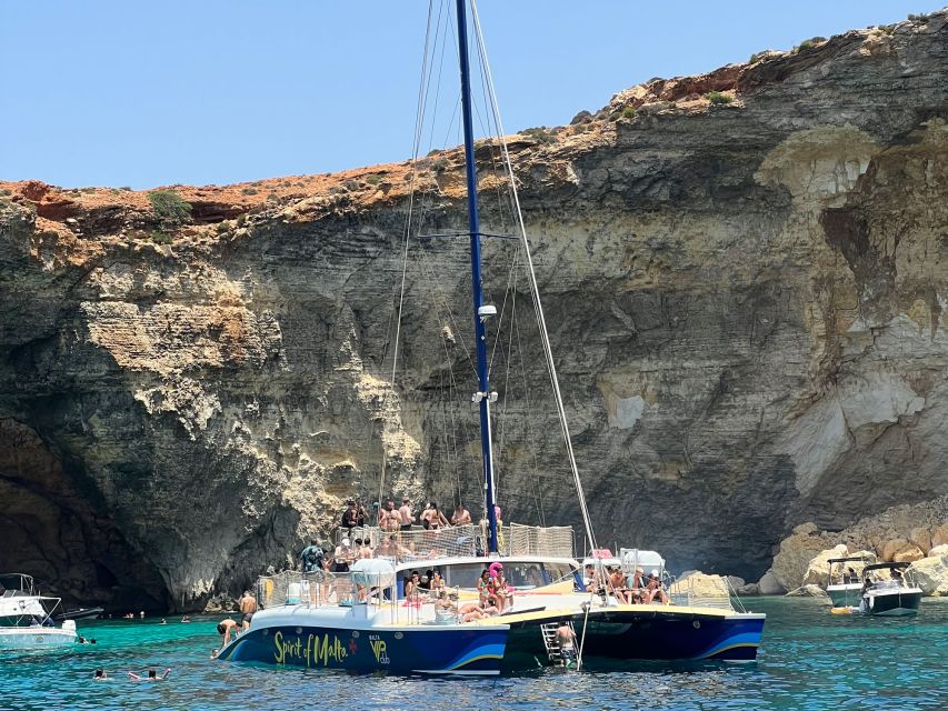 Comino: Blue Lagoon Catamaran Cruise with Lunch and Open Bar - Crystal Lagoon and changing plans
