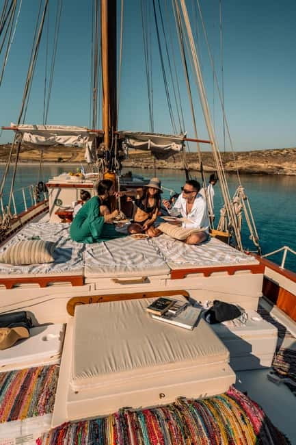 Corfu: Sunset Cruise on a Traditional Wooden Sailing Yacht - Leaving Benitses Marina before sunset