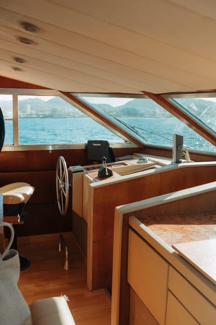 Costa Adeje: Private Yacht Trip with Watersports and Slides - The water stop at Playa de las Vistas