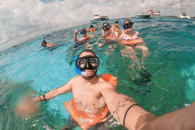 Deluxe Catamaran to Isla Mujeres, with Drinks, Snorkel & Buffet - Who will enjoy this catamaran day most
