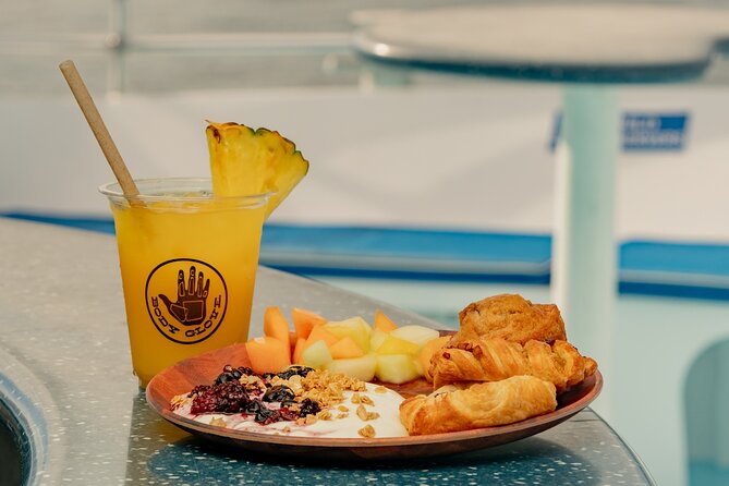 Deluxe Snorkel & Dolphin Watch Aboard a Luxury Catamaran from Kailua-Kona - BBQ lunch and the ride back