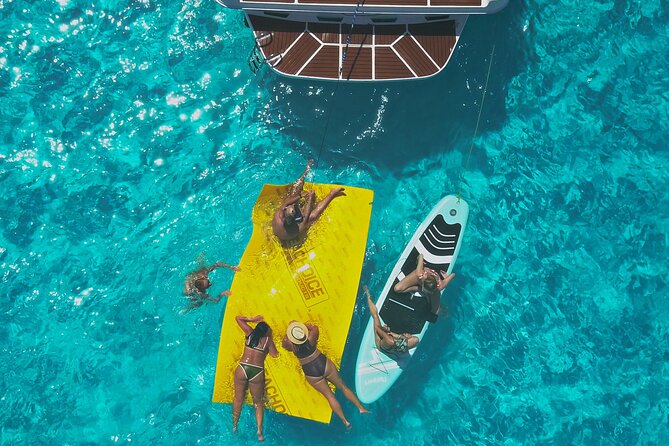 Deluxe Yacht 48FT with FlyBrige Rental in Cancun - Meeting point, timing, and weather rules