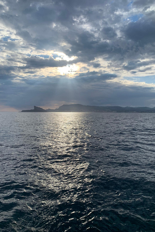 Departure from BRUSC sunset on sailing catamaran - Cruising past Six-Fours-Les-Plages and Sanary-sur-Mer