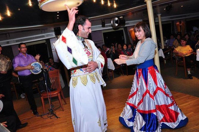 Dinner Nile Cruise belly dancer open buffer tanora show sailing on Nile - Cairo skyline views from the river