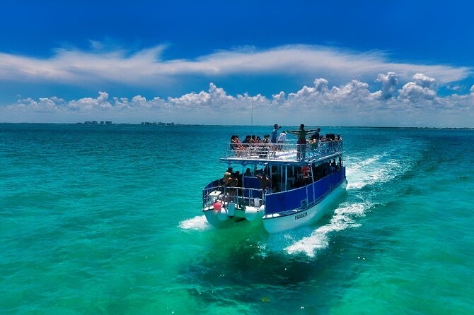 Discovering Isla Mujeres on a Double Decker Catamaran - The return ride and sunset over Cancun