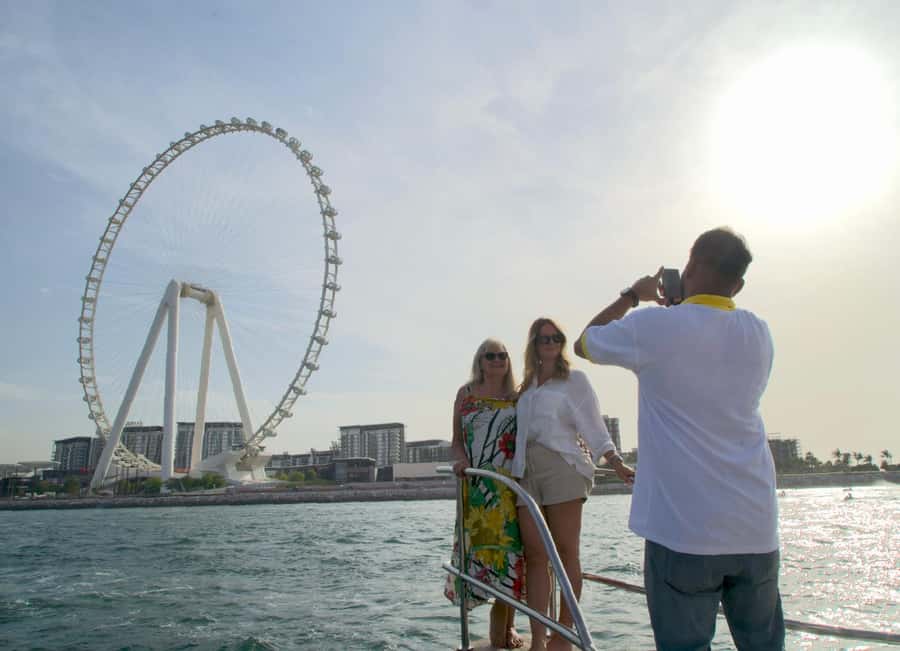 Dubai: Luxury Sunset Yacht Tour with Snacks and Drinks - The boat, decks, and onboard mood