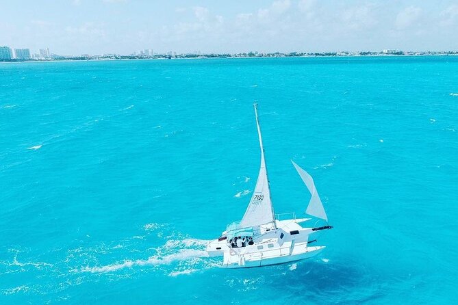 Exciting Catamaran Tour to Isla Mujeres, from Cancún! - Crew, music, and the social mood