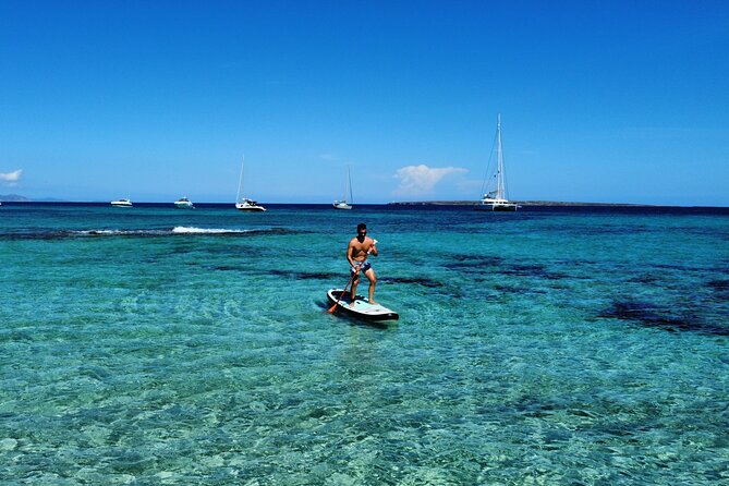 Formentera & Espalmador: Full-Day Private Sailboat Trip - Es Pujols, a sheltered bay for paddling