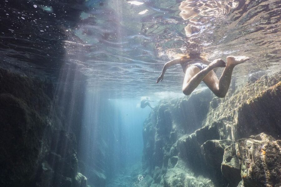From Adamas: Milos and Poliegos Catamaran Cruise with Lunch - Sykia Cave and the volcanic coast