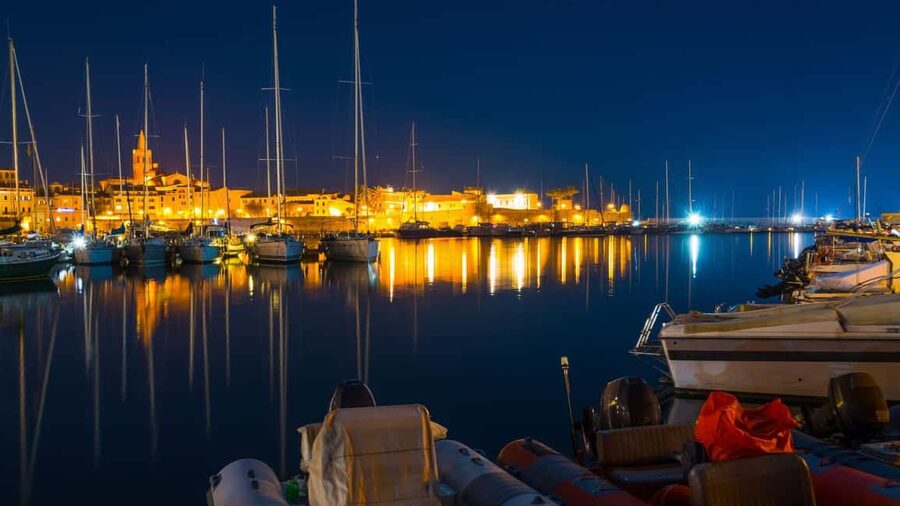 From Alghero: sunset on a sailing boat with aperitif - Sailing out from Alghero at sunset