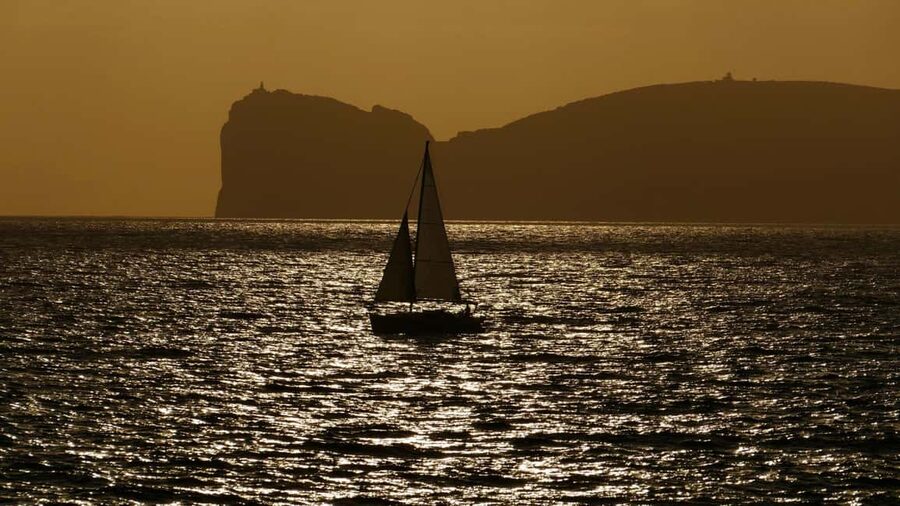 From Alghero: sunset on a sailing boat with aperitif - Swimming after sunset
