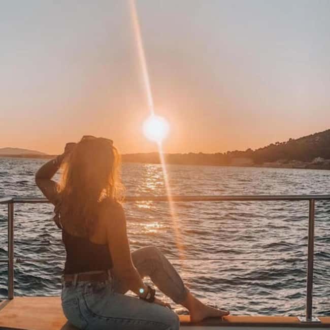 From Denia: Sunset Catamaran Trip - Cliffs, coastline, and the 50-minute sunset pause