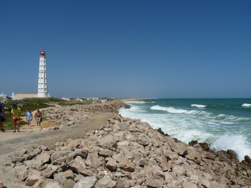 From Faro: 2-Island, 2-Stop Ria Formosa Catamaran Tour - Farol Island, lighthouse, and former fishing community