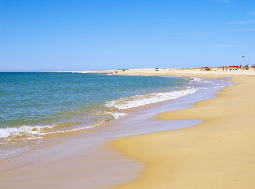 From Faro: 4 Stops, 3 Islands in Ria Formosa Catamaran Tour - Guide quality and group feel