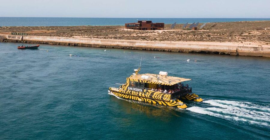 From Faro: Catamaran Boat Trip to Deserta Island with Stop - From Faro Old Town to the open water