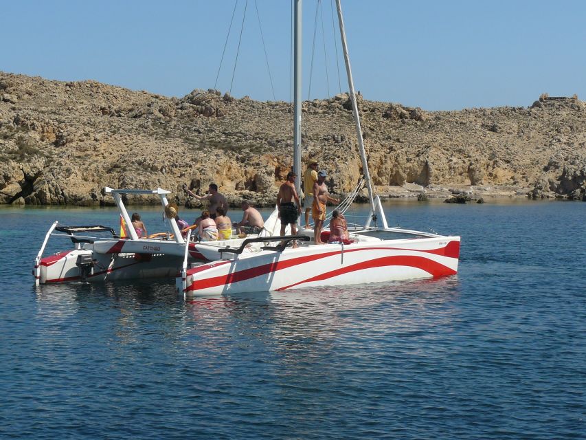 From Fornells: Half-Day Menorca Catamaran Trip w/ Snorkeling - Swimming and Snorkeling in Clear Water