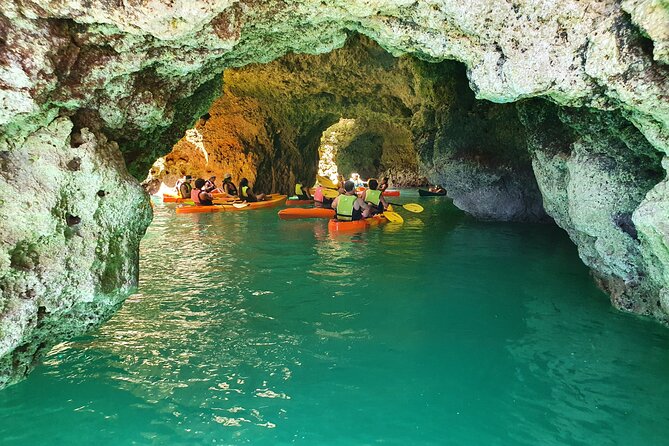 From Lagos: Kayak Tour of Ponta da Piedade Caves on Catamaran - Paddling through the caves and cliffs